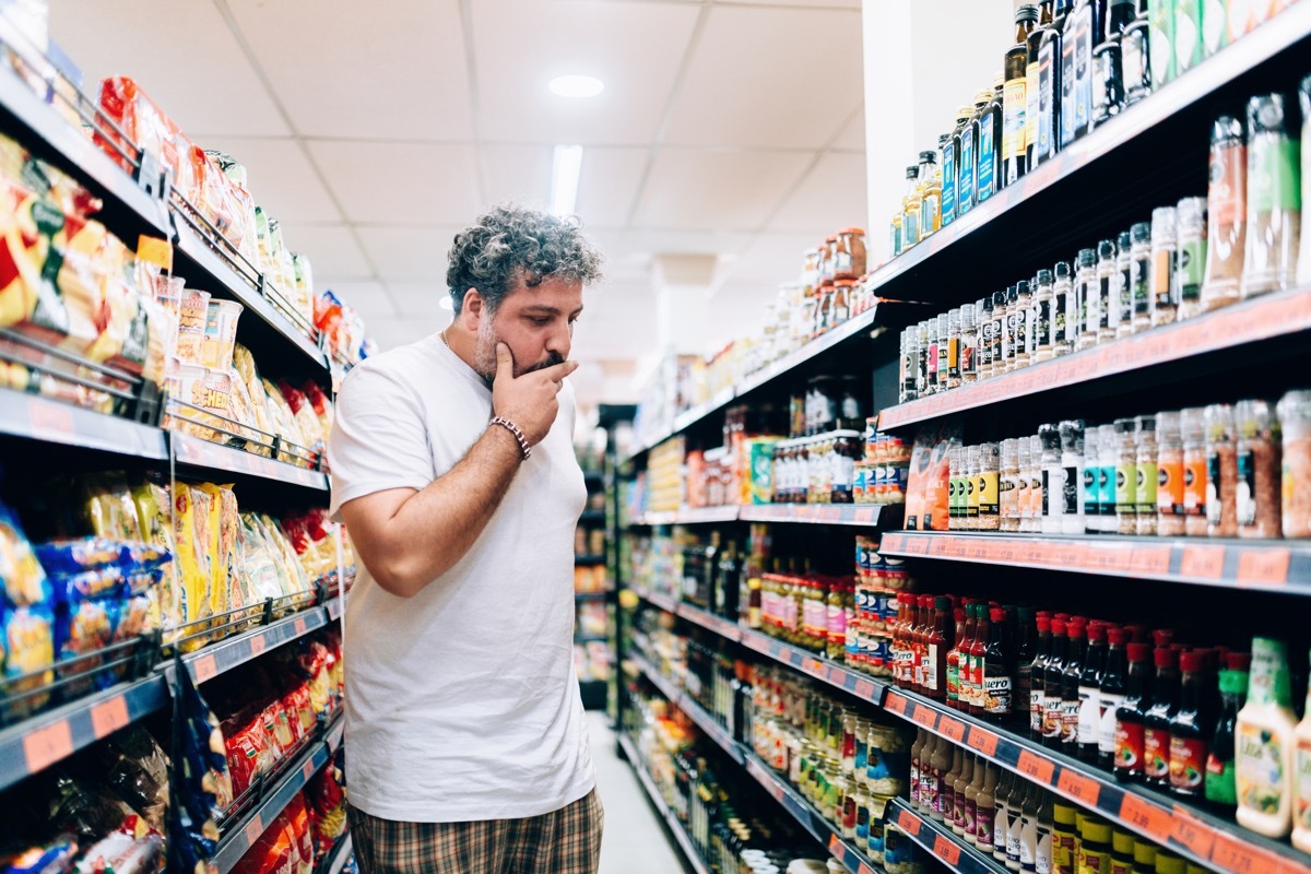 Man shopping at market grocery store