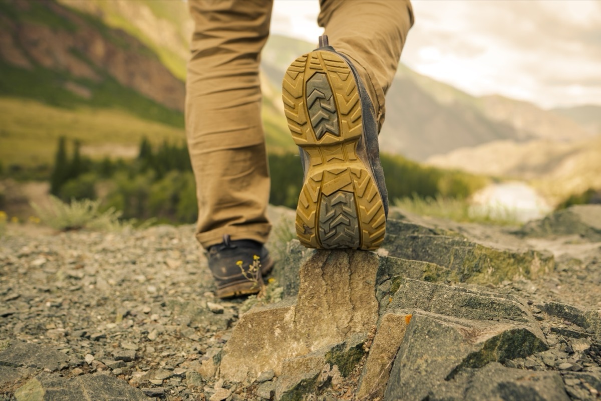 man wearing hiking boots