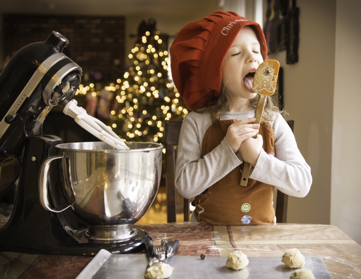 Little girl making cookies on Christmas