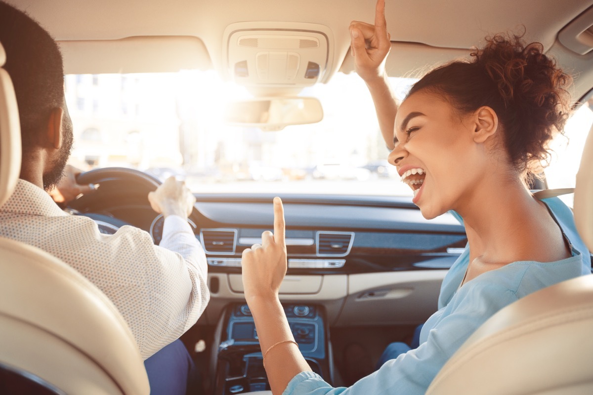 Woman singing in the car