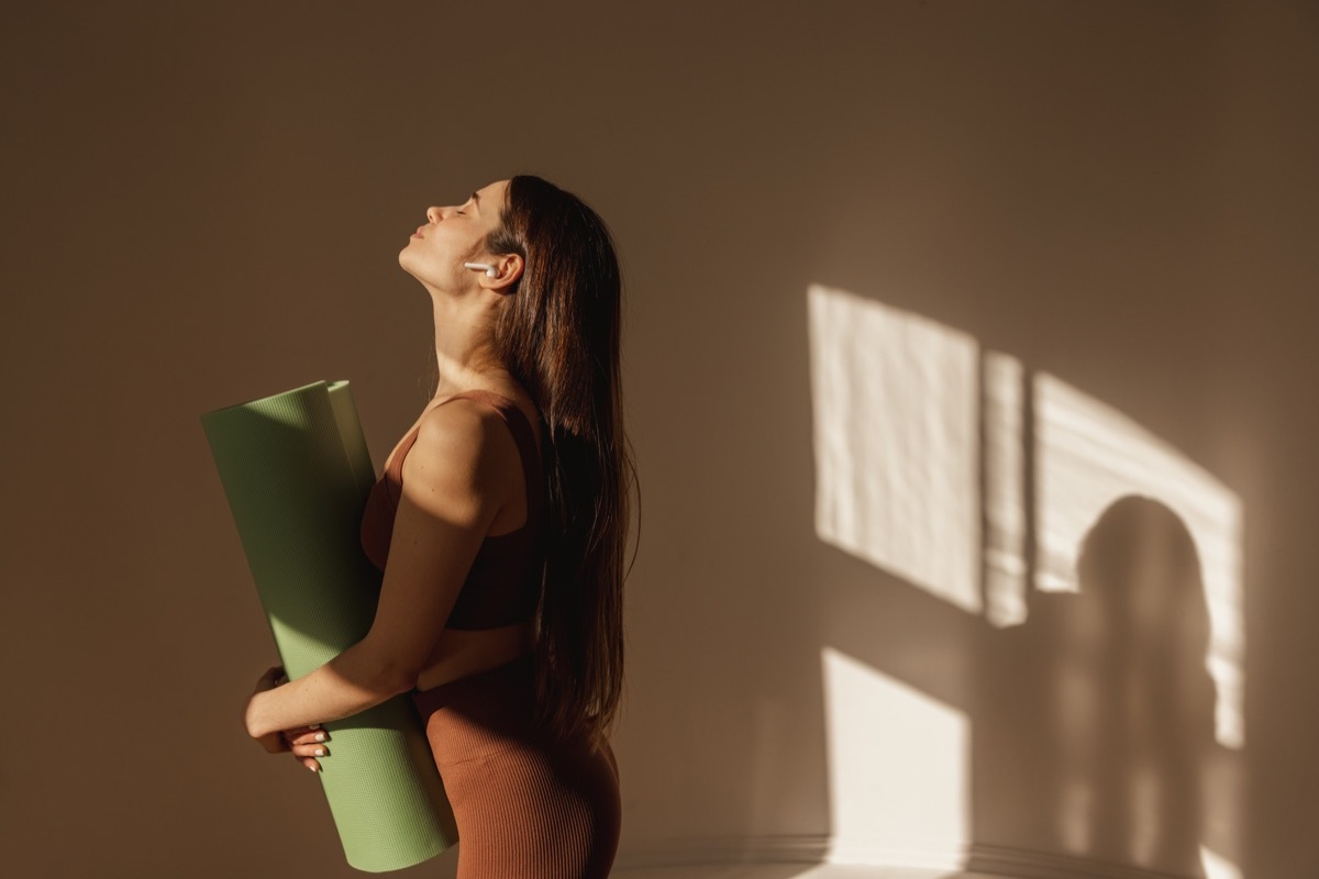 woman about to start yoga in the morning