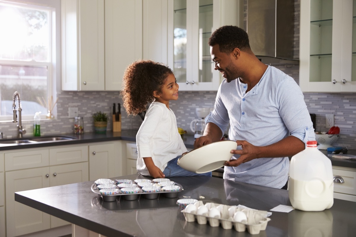 Dad baking with daughter