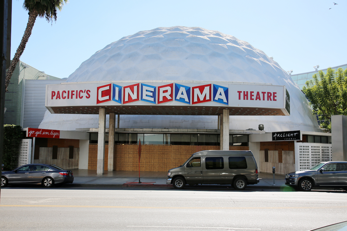 The Cinerama Dome with doors and windows boarded up in November 2020