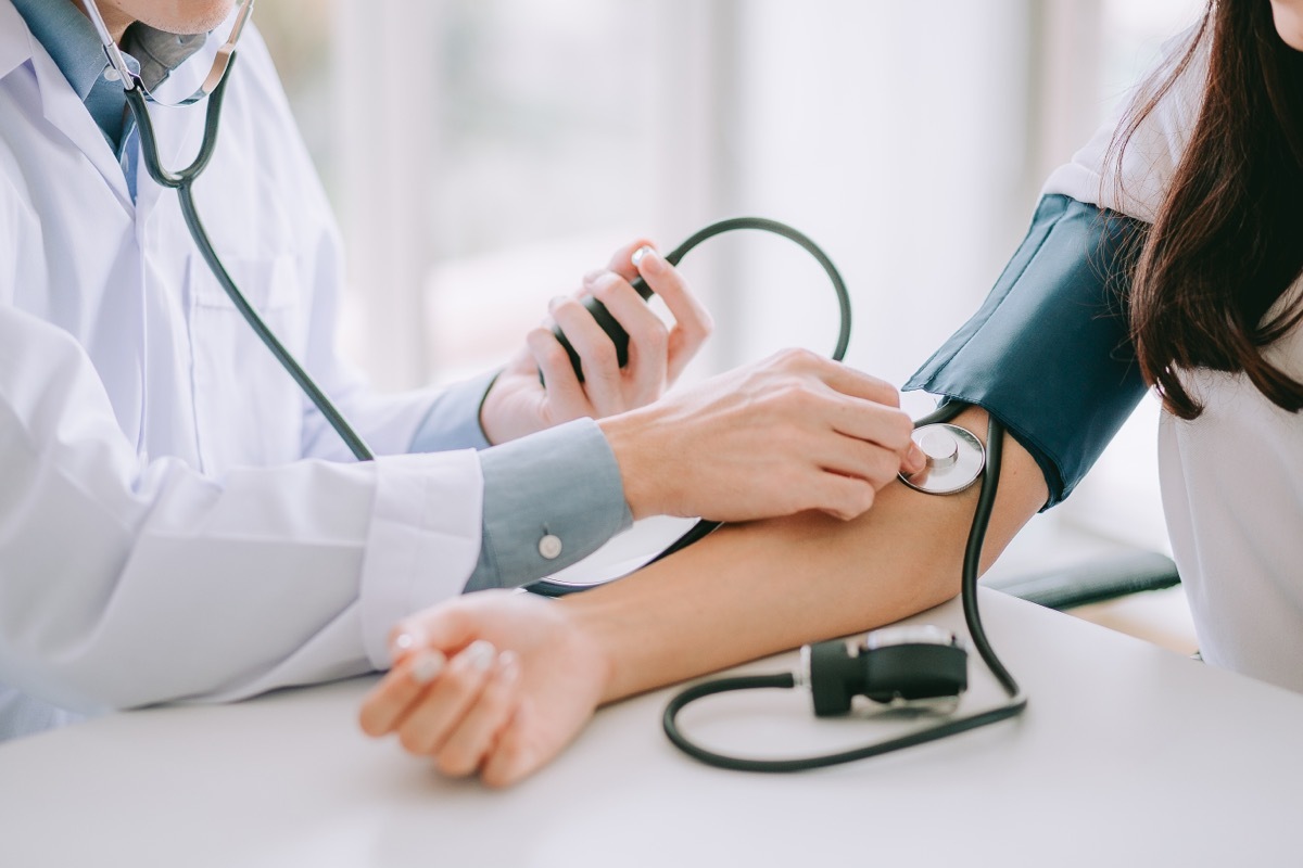 Woman getting her blood pressure taken.