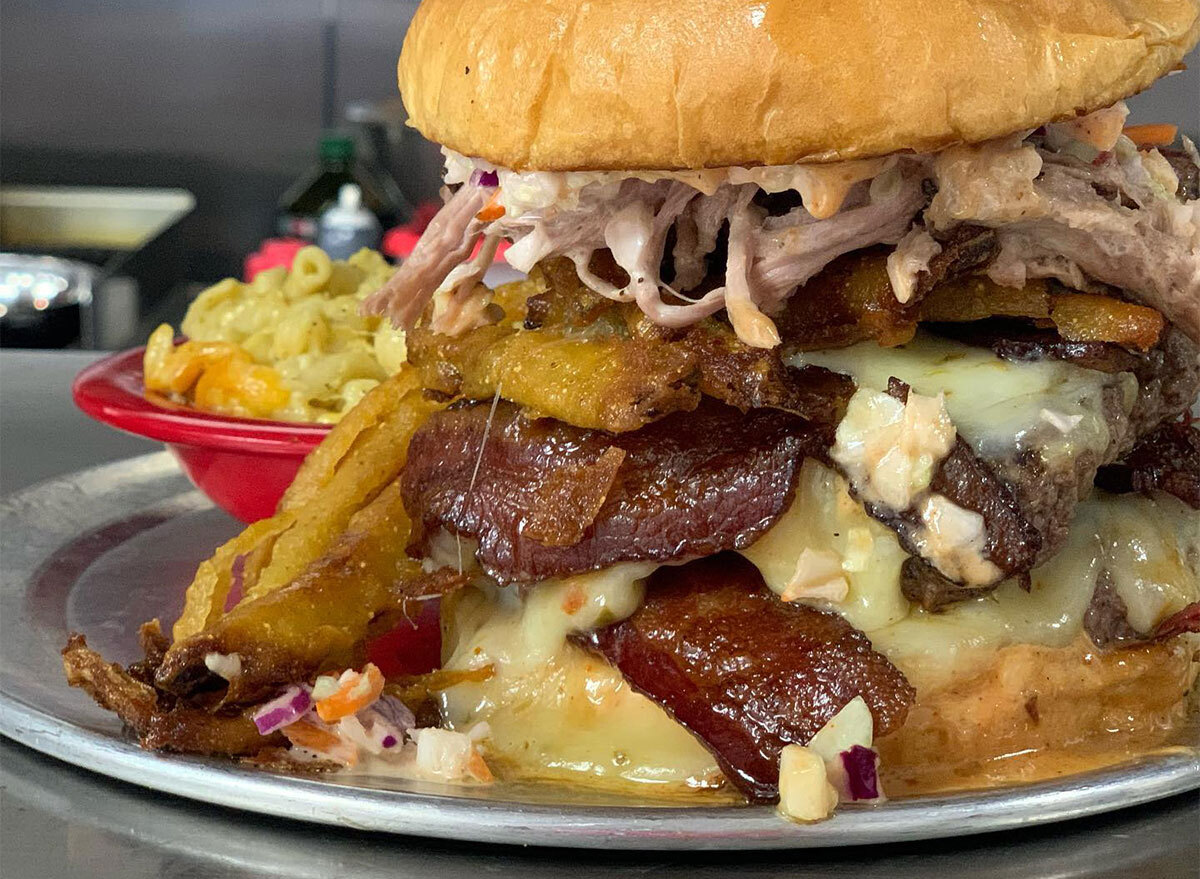 burger topped with bbq fixings