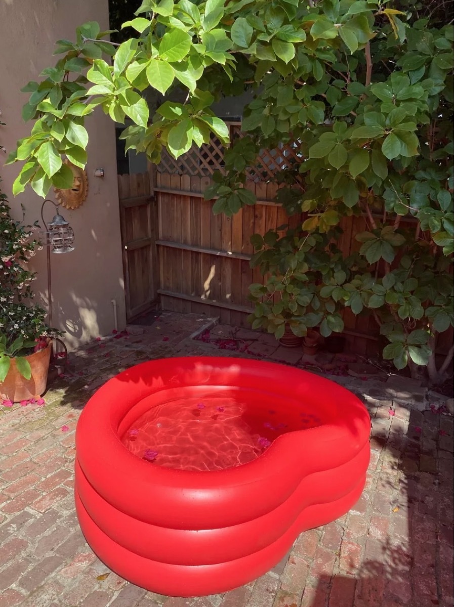 red inflatable heart shaped pool