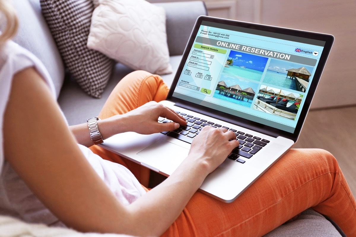 woman making hotel reservation online 