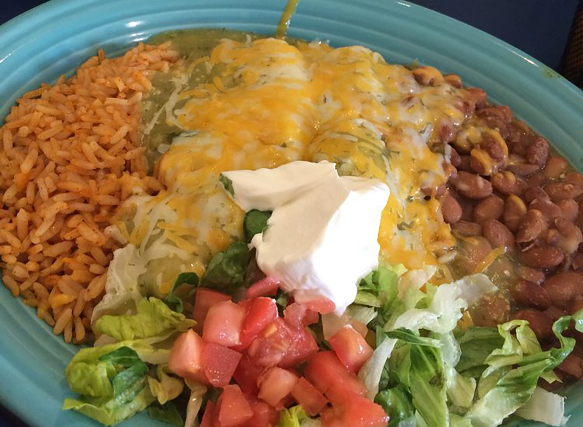 two enchiladas with rice and beans