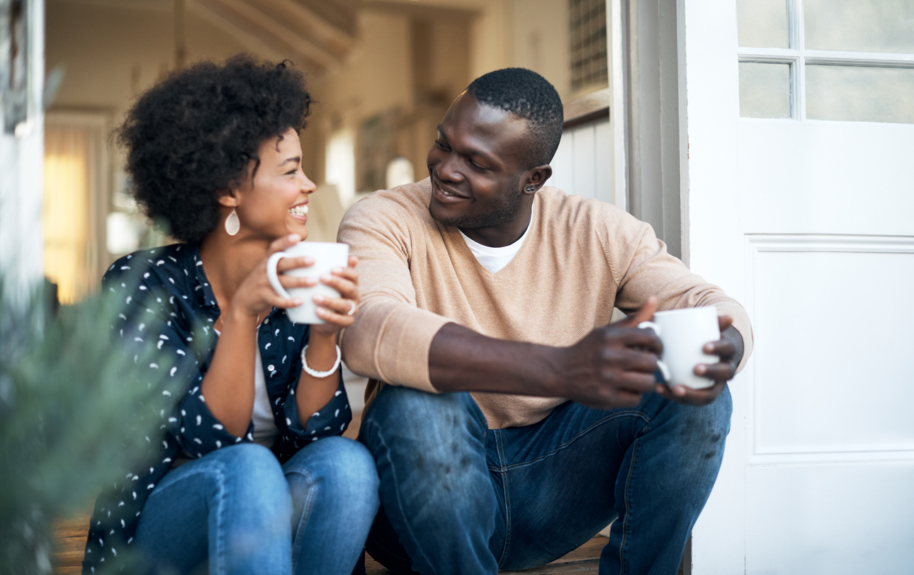 happy young couple spending time together outside