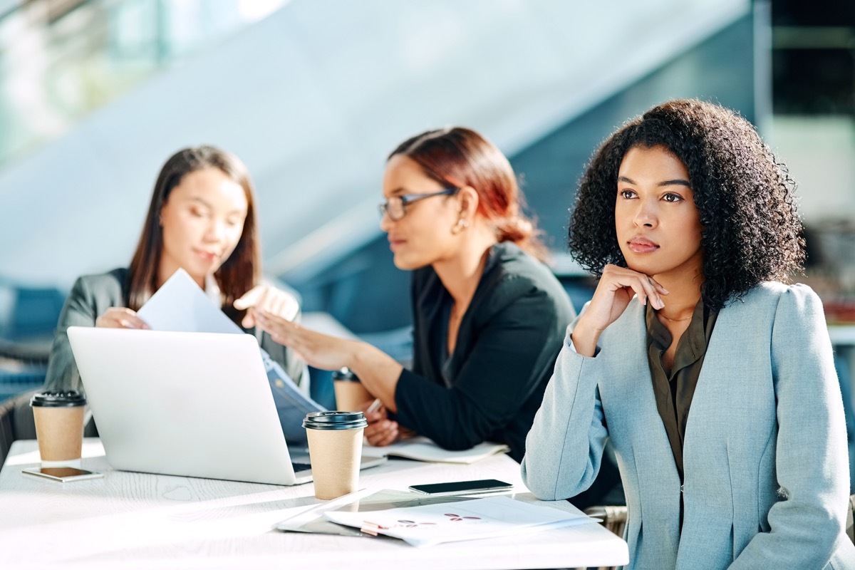 Cropped shot of young businesswomen having a meeting in the convention centre