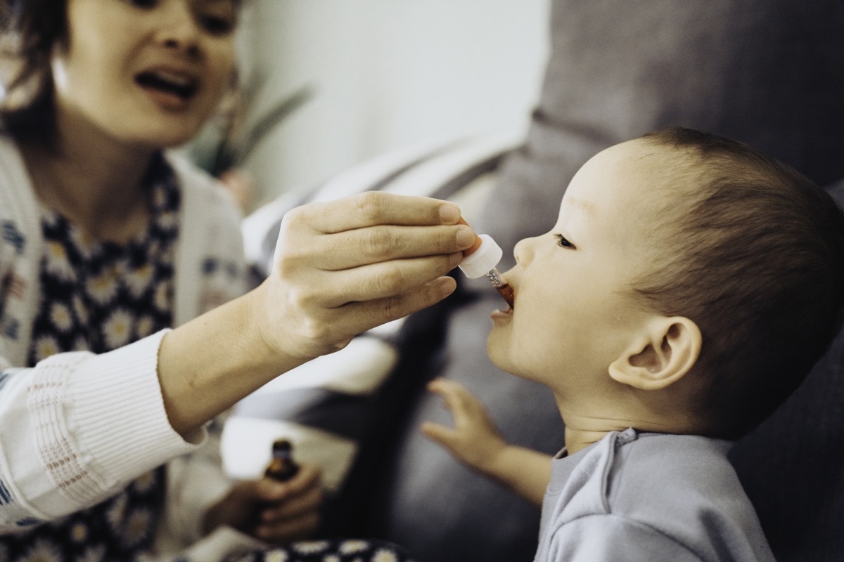 baby receiving oral medicine