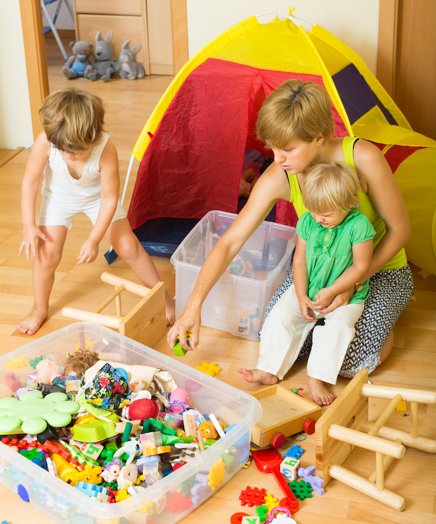 Family Using Storage Containers Tricks for hiding children's toys