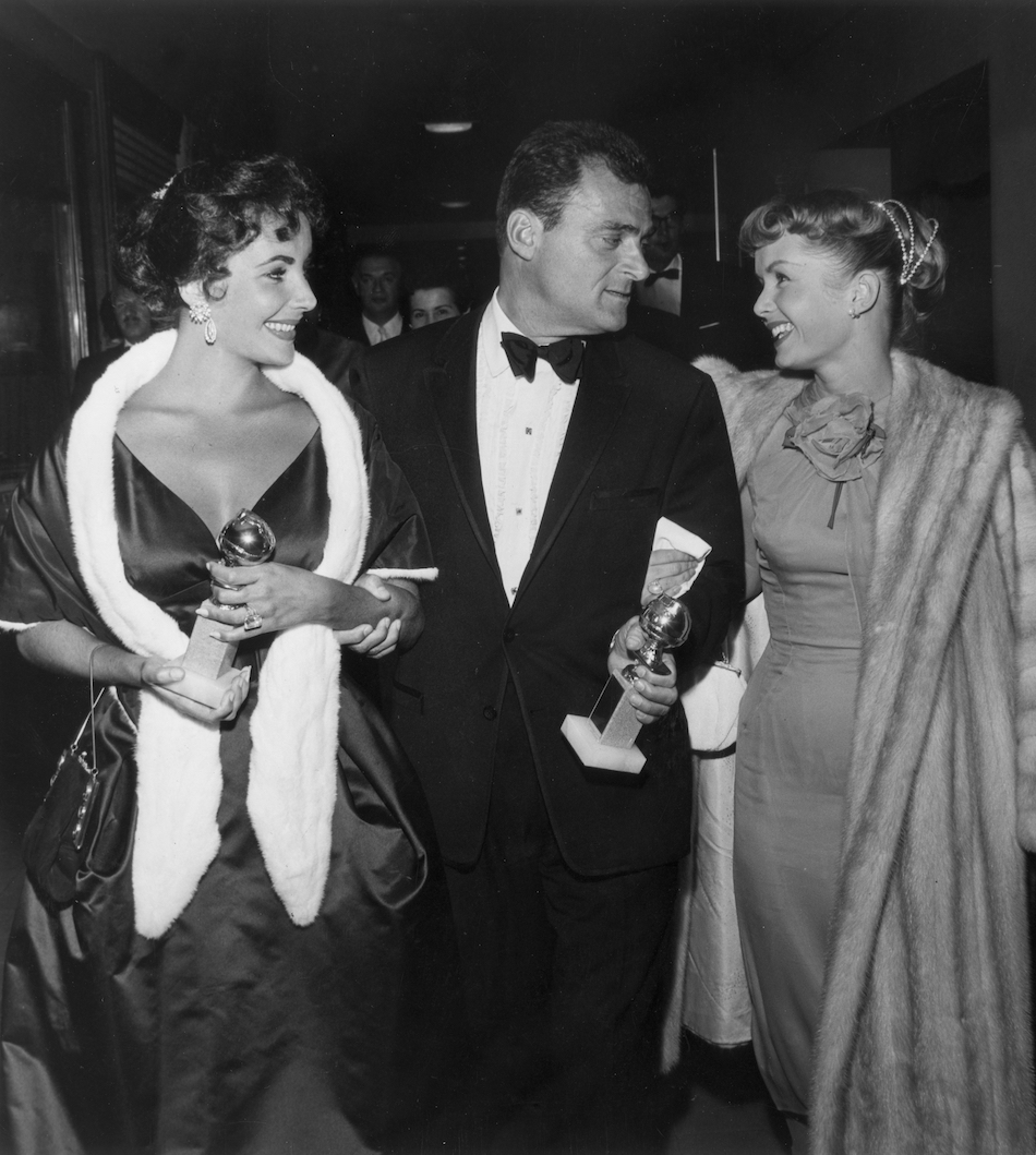 Elizabeth Taylor, Mike Todd, and Debbie Reynolds at the Hollywood Foreign Press Association Awards Dinner in 1957