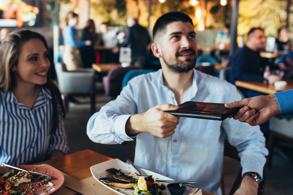 Man paying the whole bill on a date