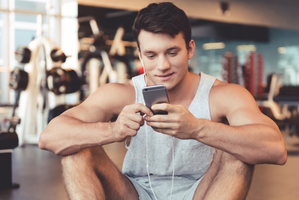 man using app at gym, Worst Food Myths