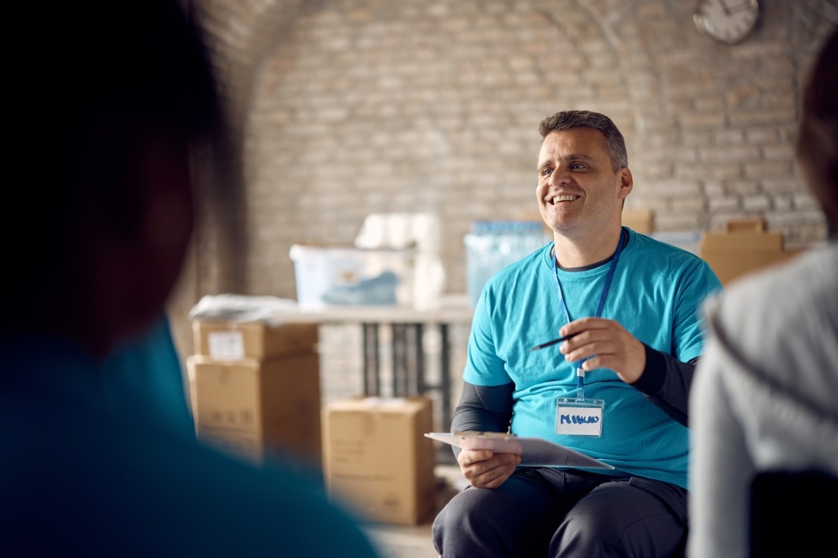 man leading group of volunteers