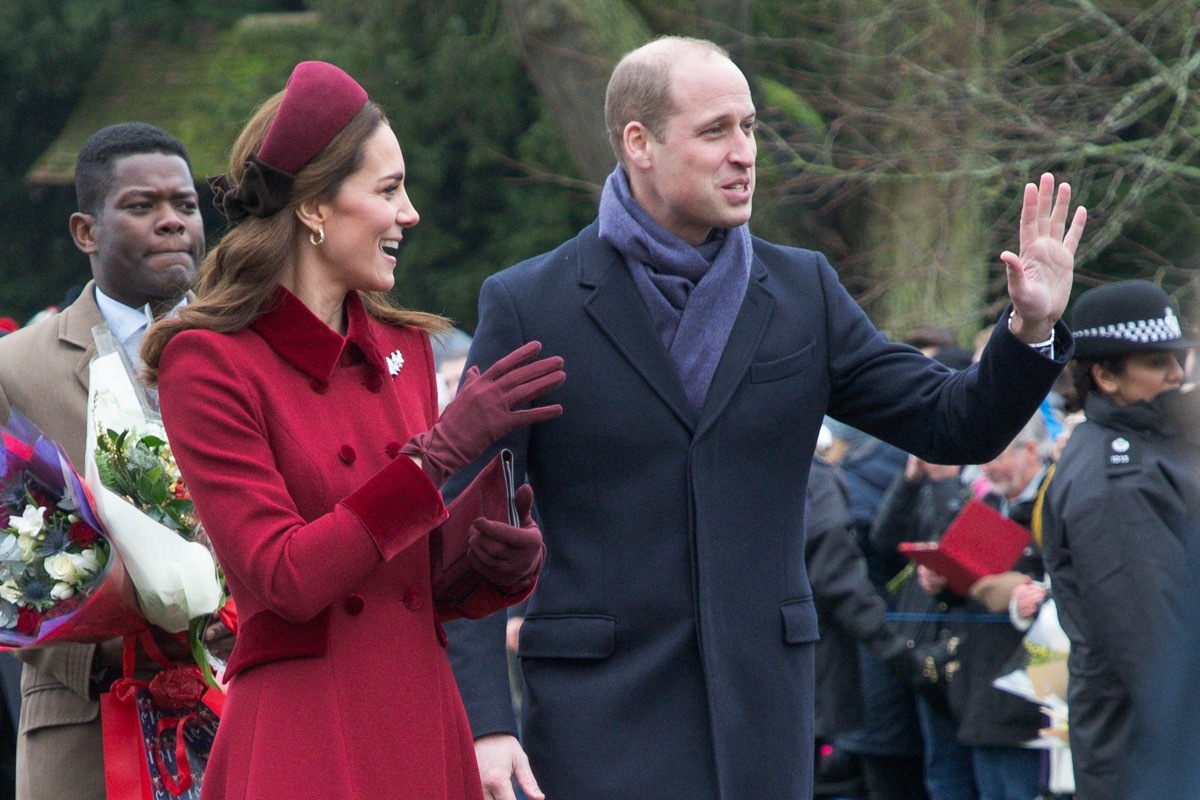 The Duchess of Cambridge receiving a plant for Princess Charlotte from a well wisher after the Christmas Day morning church service at St Mary Magdalene Church in Sandringham, Norfolk