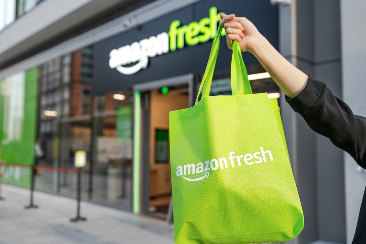 amazon fresh bag in front of store