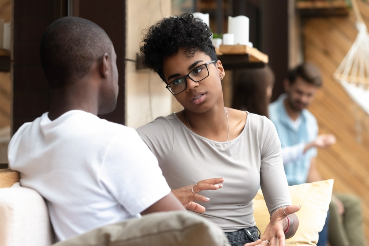 couple having a serious conversation in public