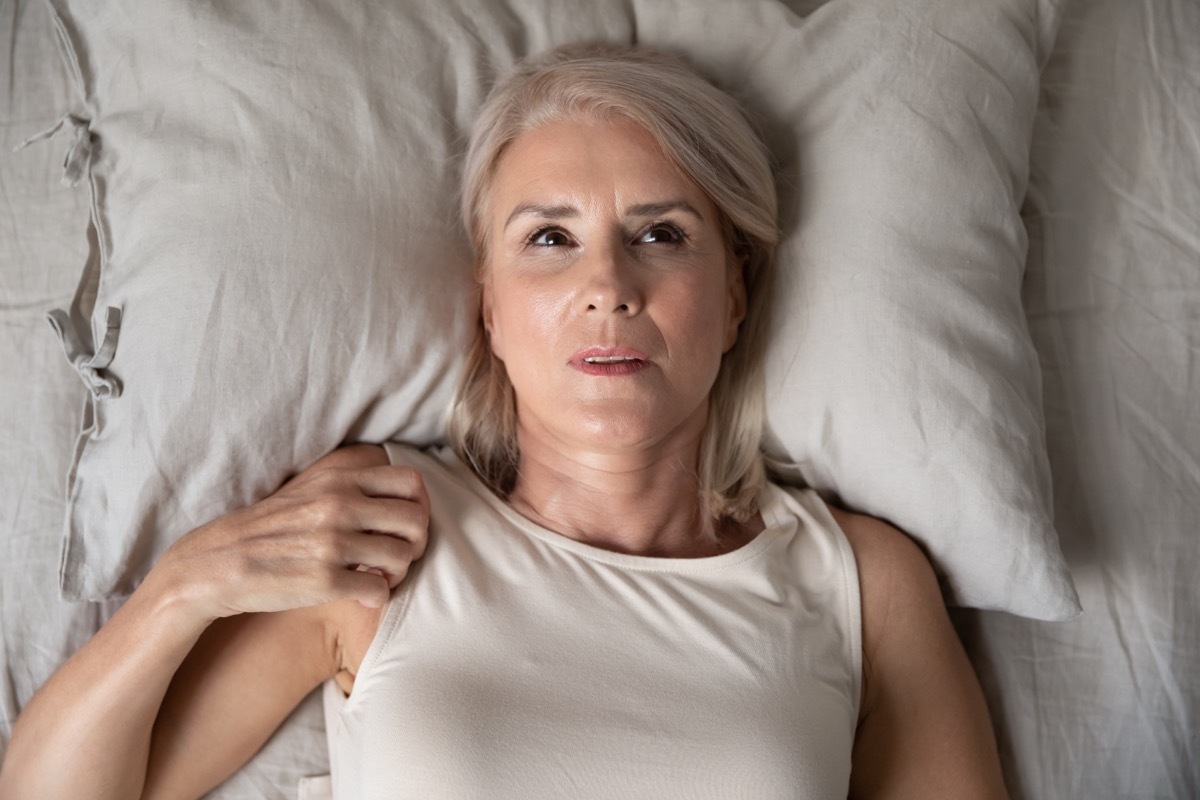 woman awake in bed