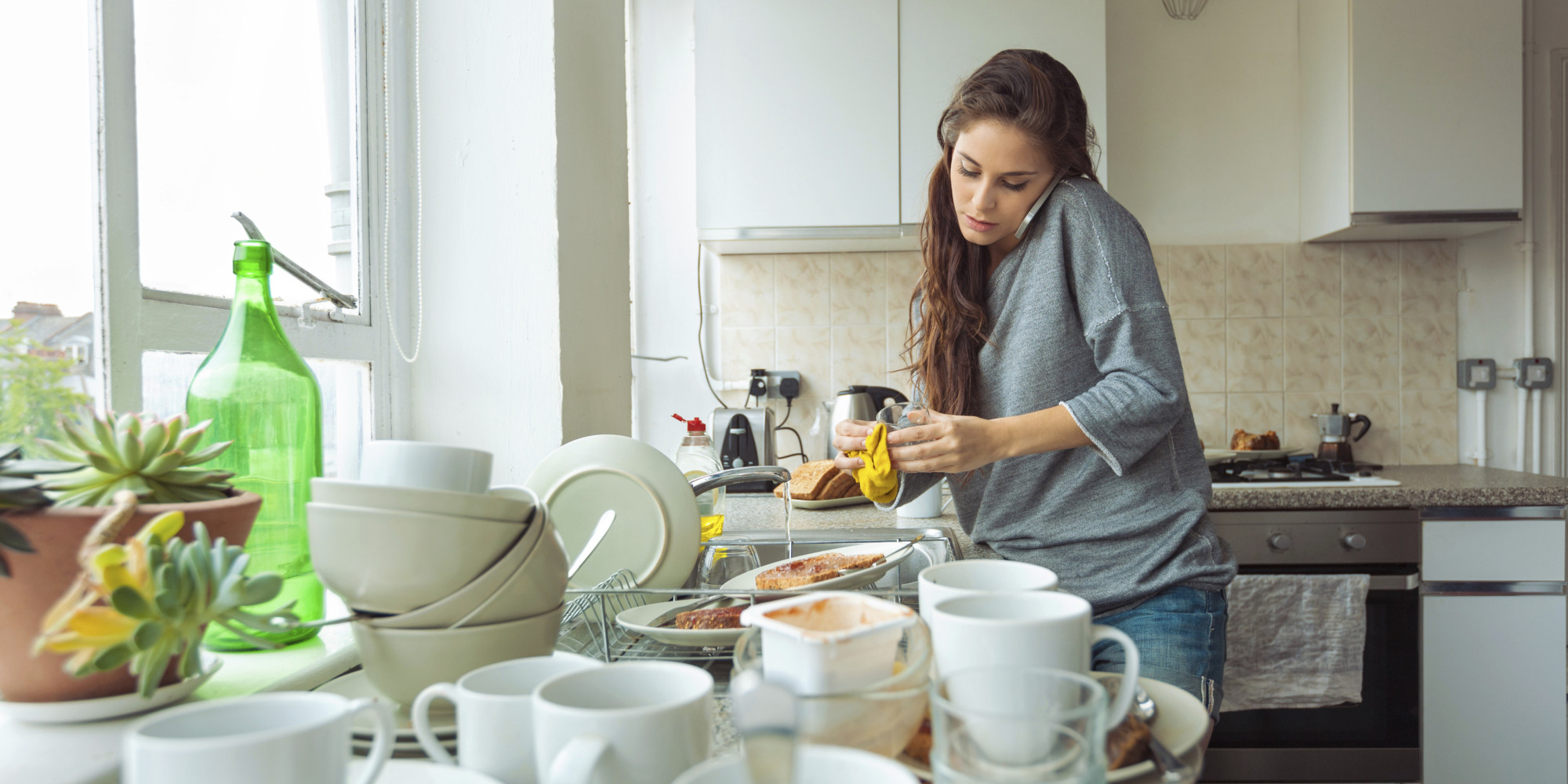 Woman washing dishes