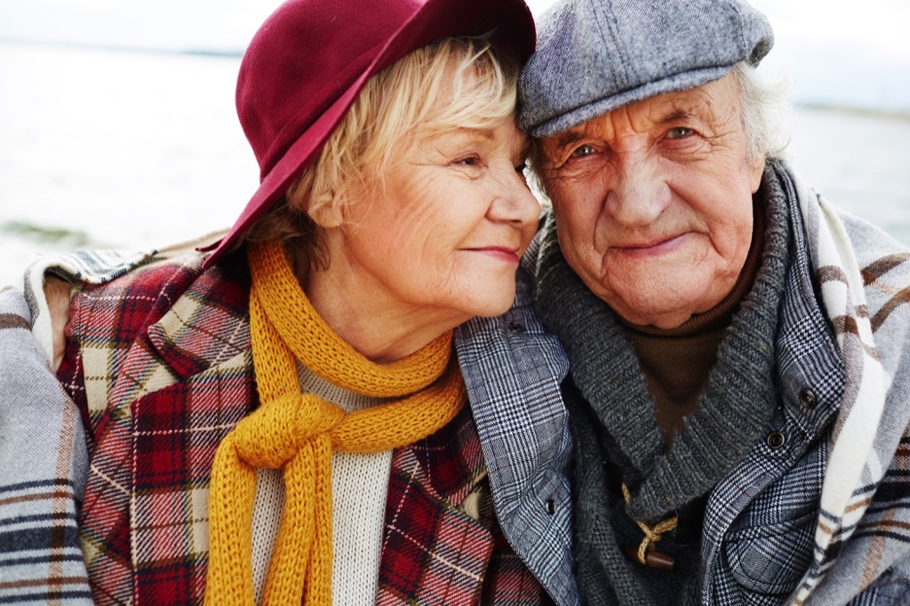 elderly couple in hats