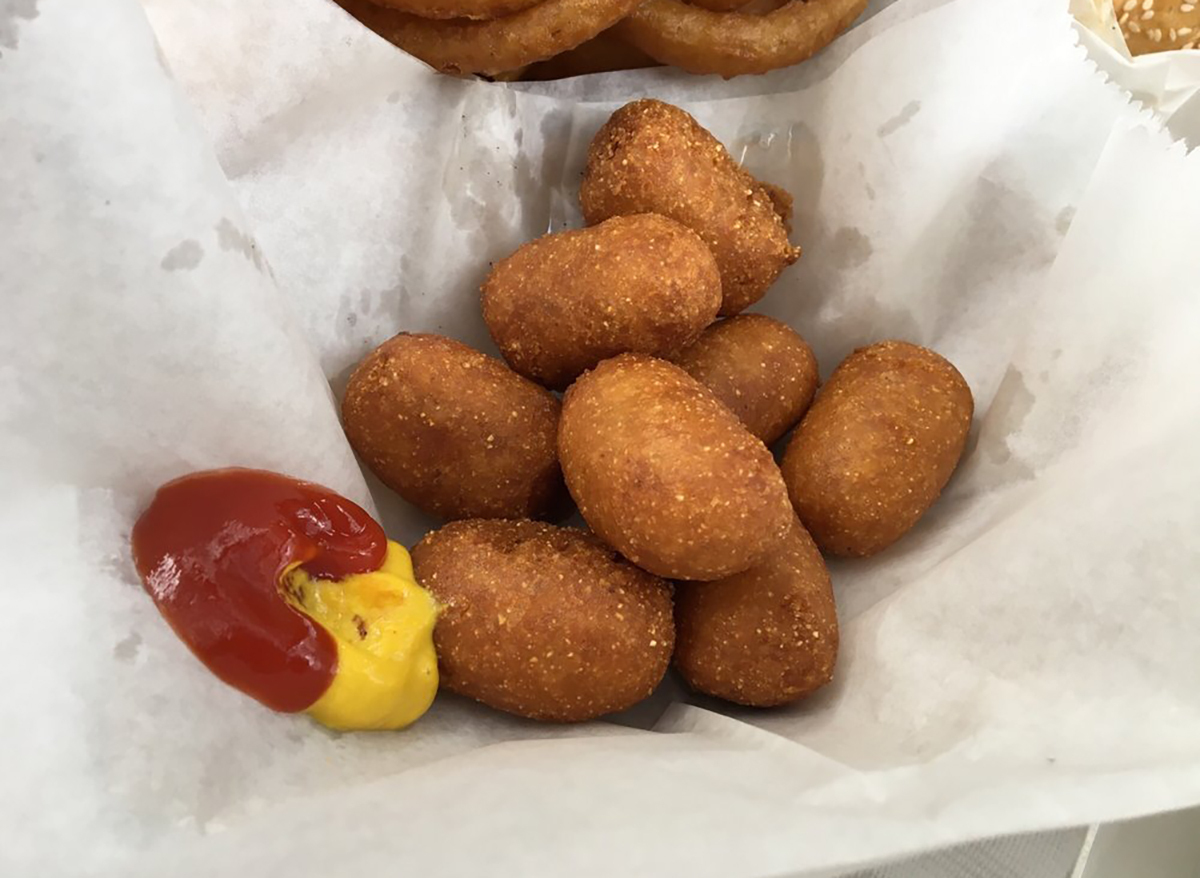 mini corn dogs in wax paper