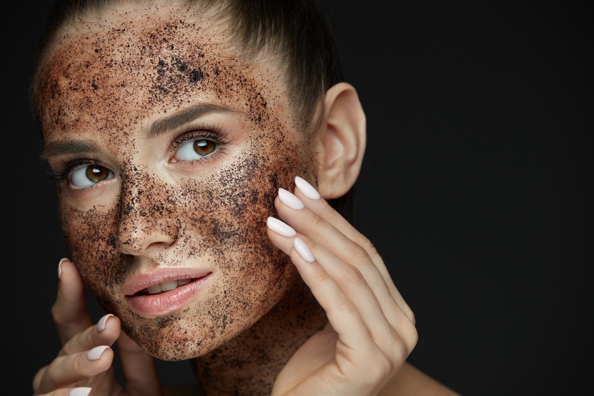 Woman exfoliating