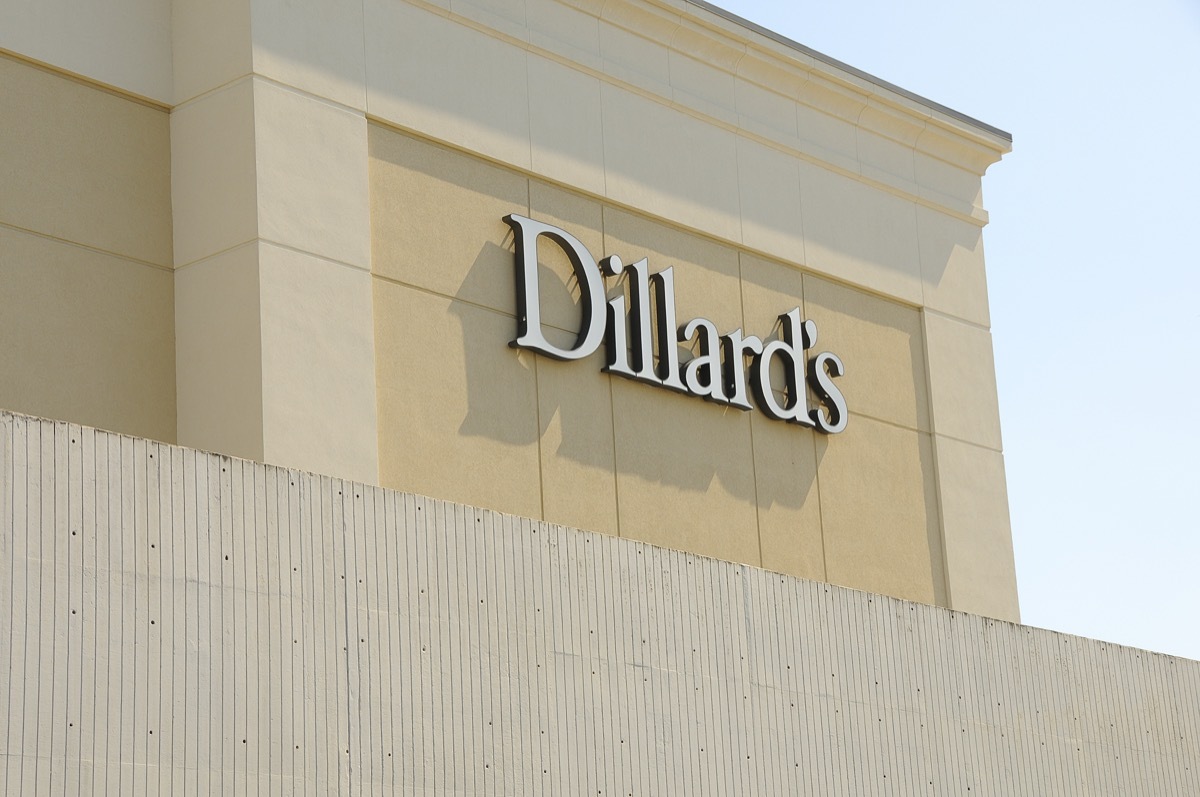 A Dillard's department store logo is seen on a clear, blue sky day. Dillard's was started in 1938 in Nashville, Arkansas and today has app