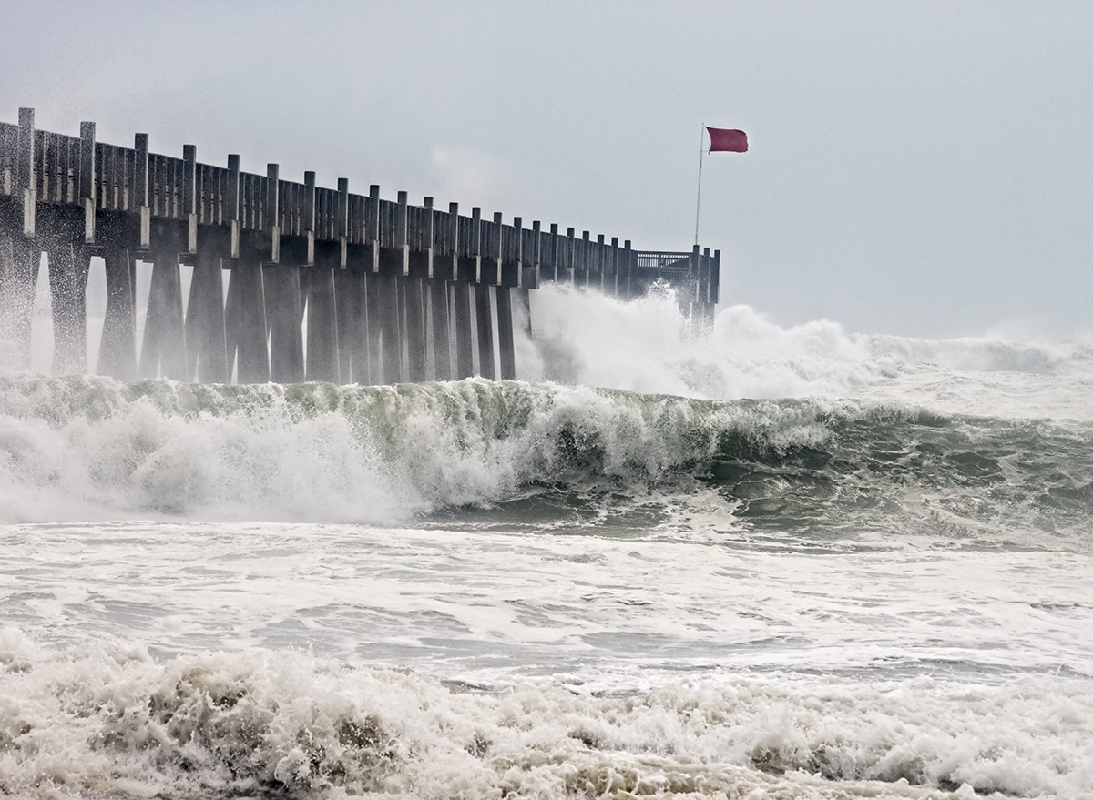 Waves hitting a pier