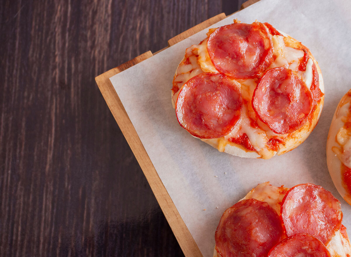 mini pizzas on wax paper