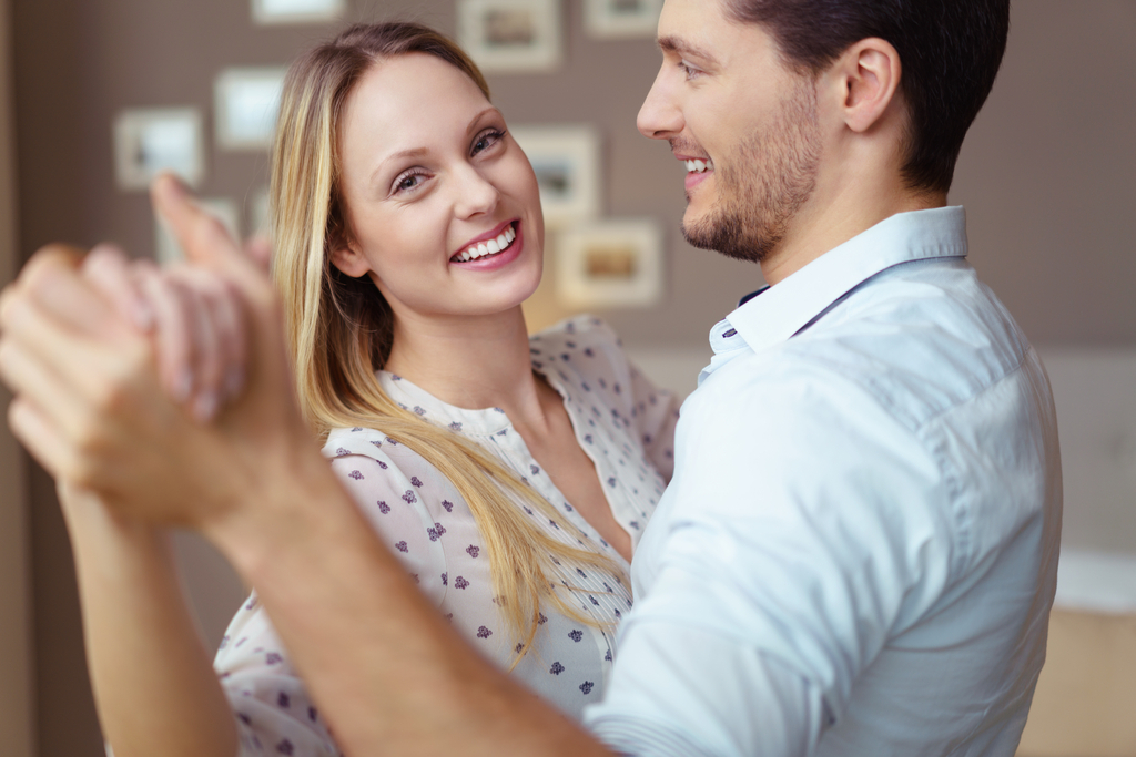 Couple Dancing at Home Romance