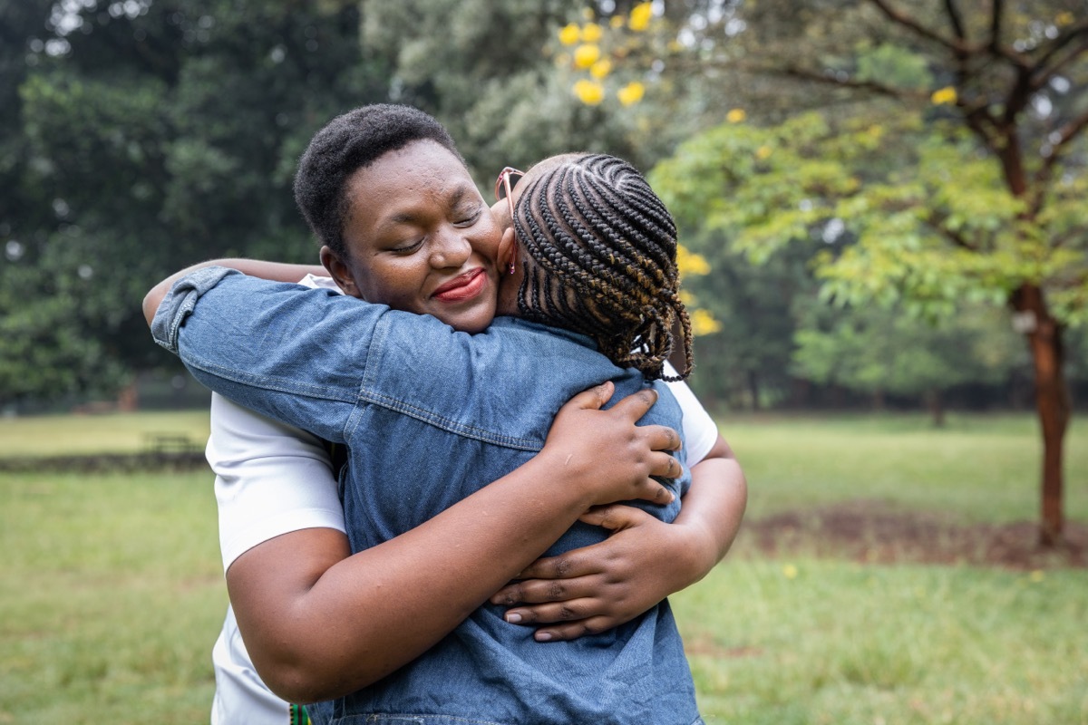 woman hugging friend