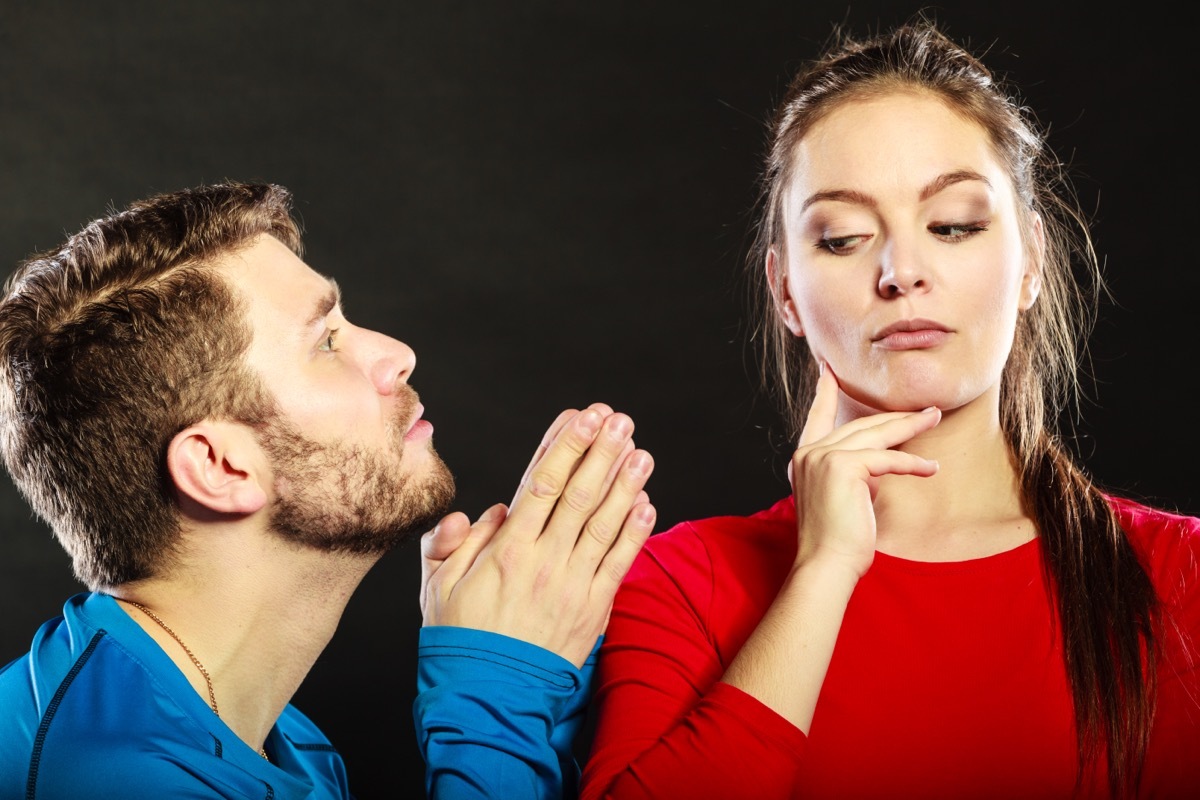 man begging woman for forgiveness