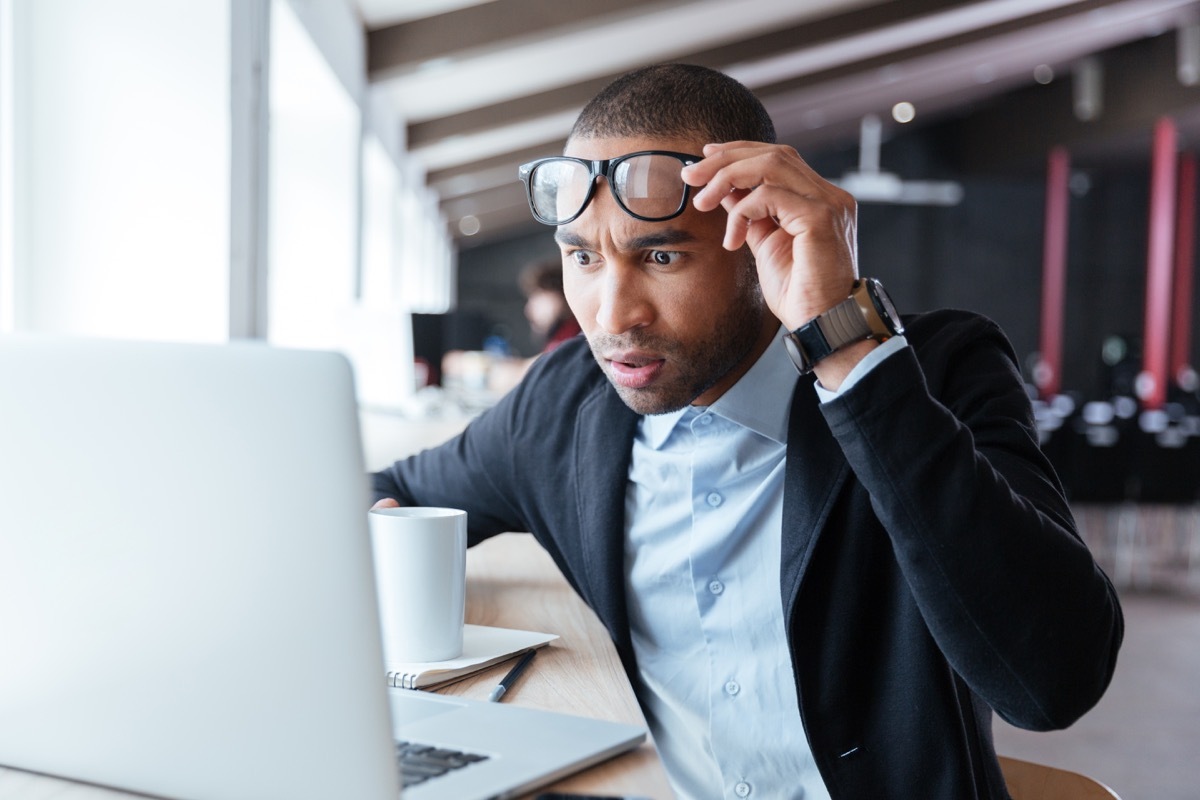 man confused at computer