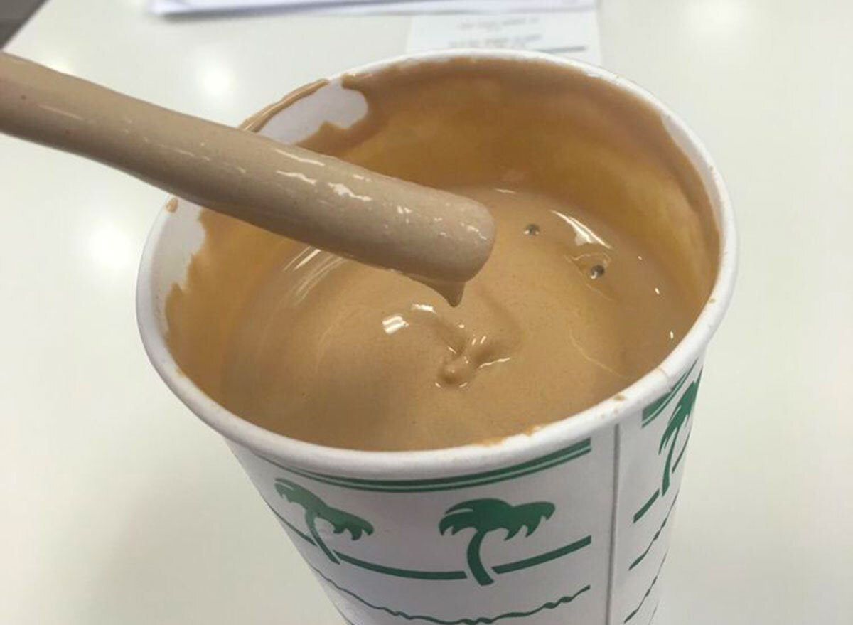 In-n-out chocolate shake with straw dripping