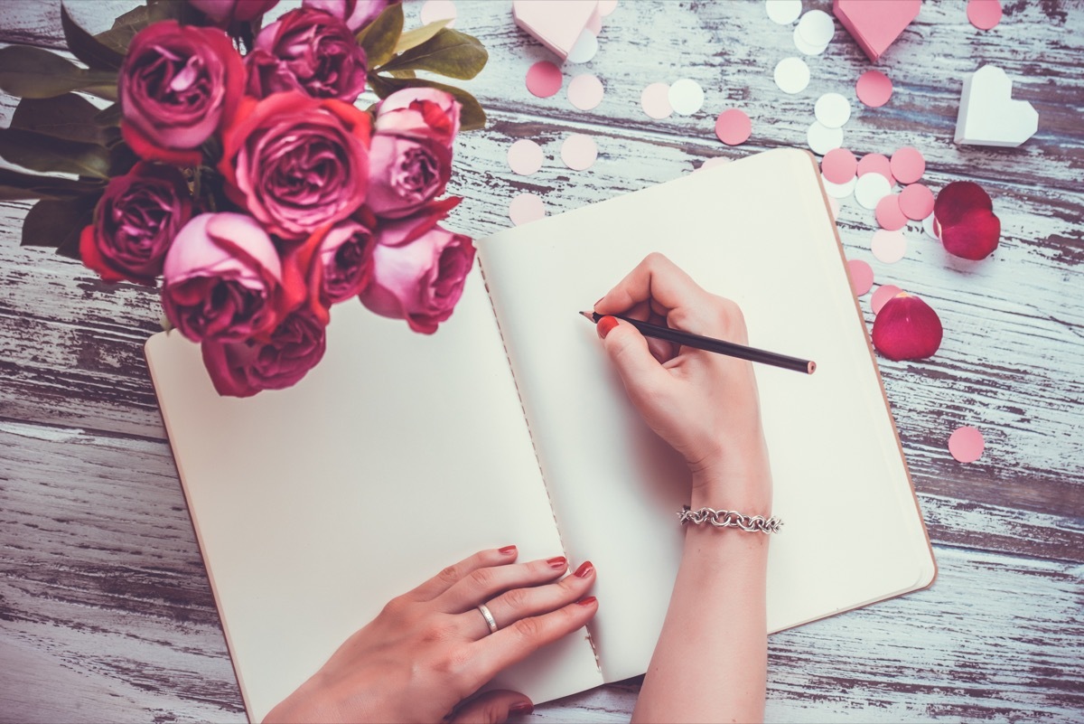 Woman writing a love letter