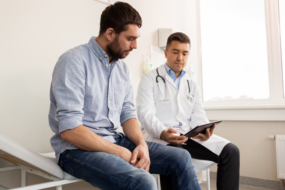 Man talking with doctor