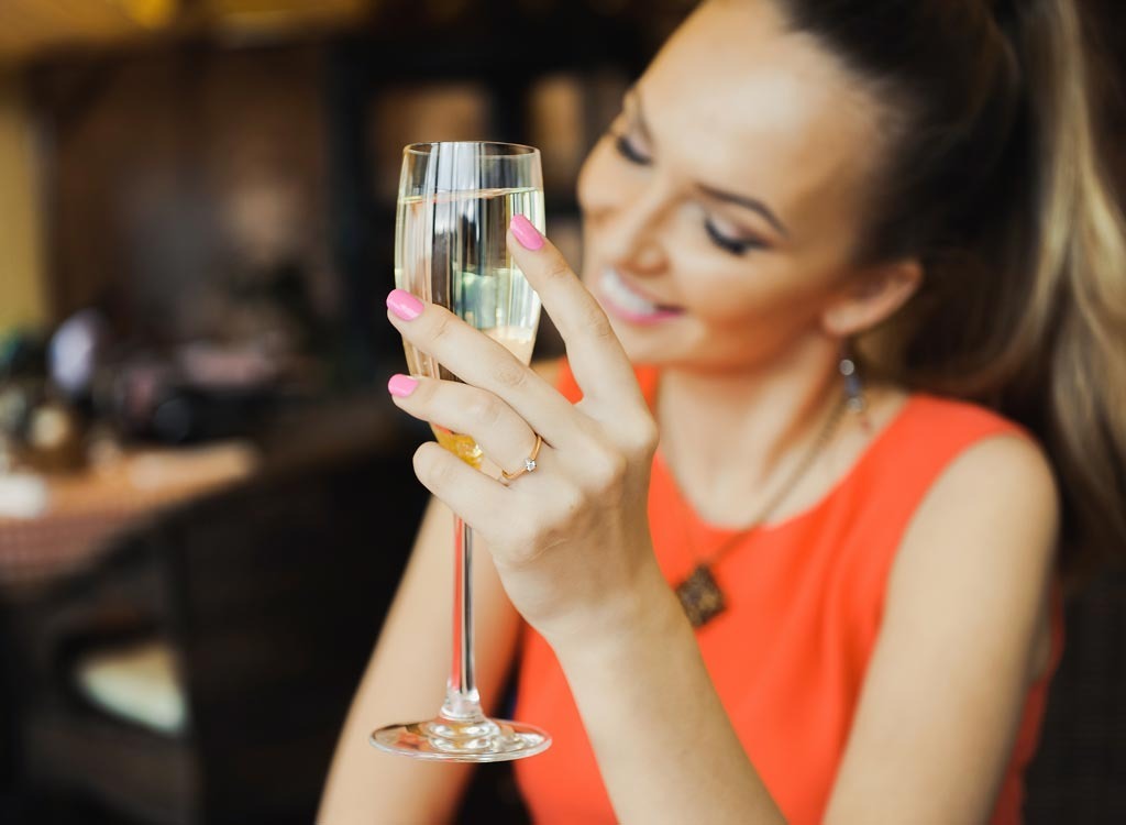 Woman drinking champagne