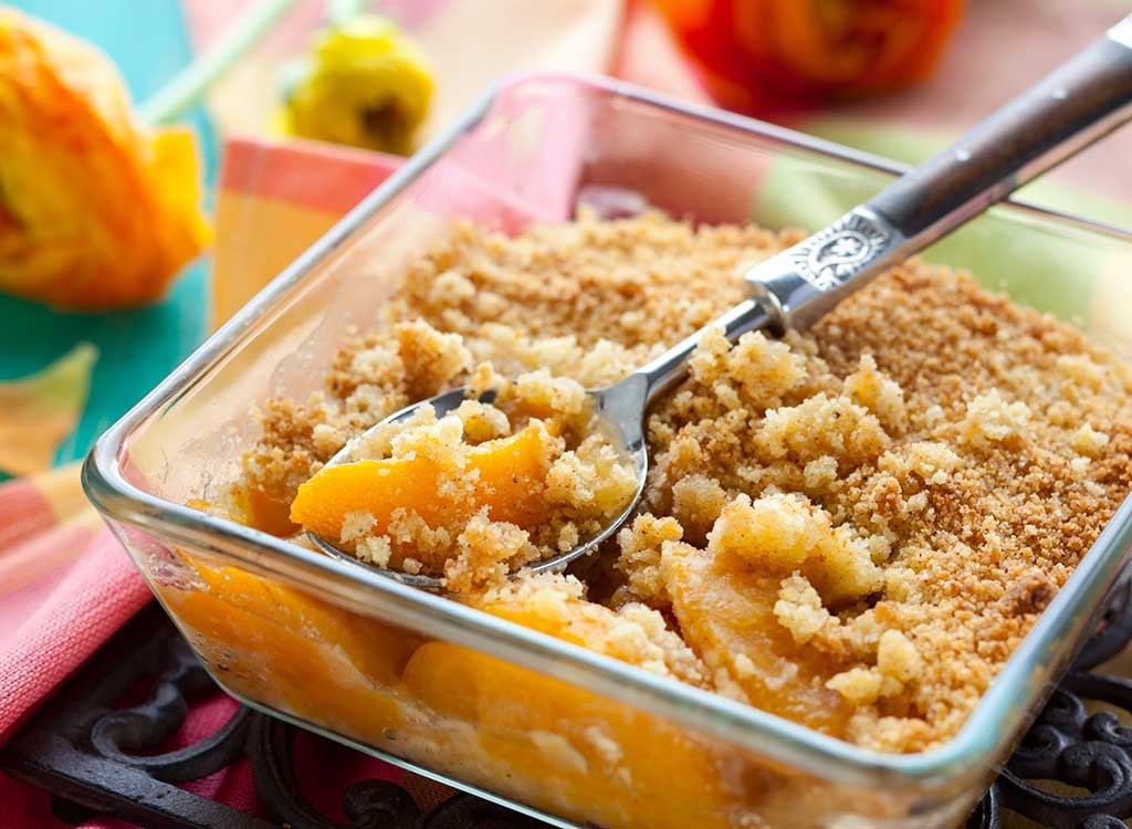 serving of peach cobbler with spoon