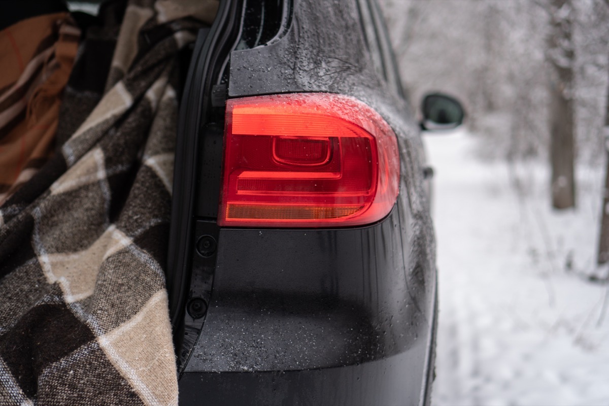 blanket in the trunk of a car