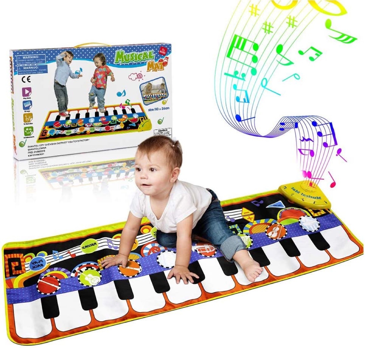 infant crawling on toy piano floor mat