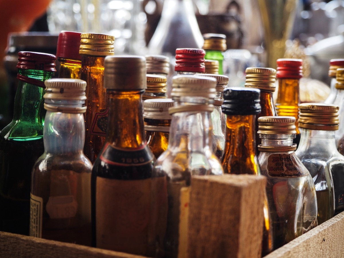 Old small glass drink bottles sold in antique market. Ankara - Turkey