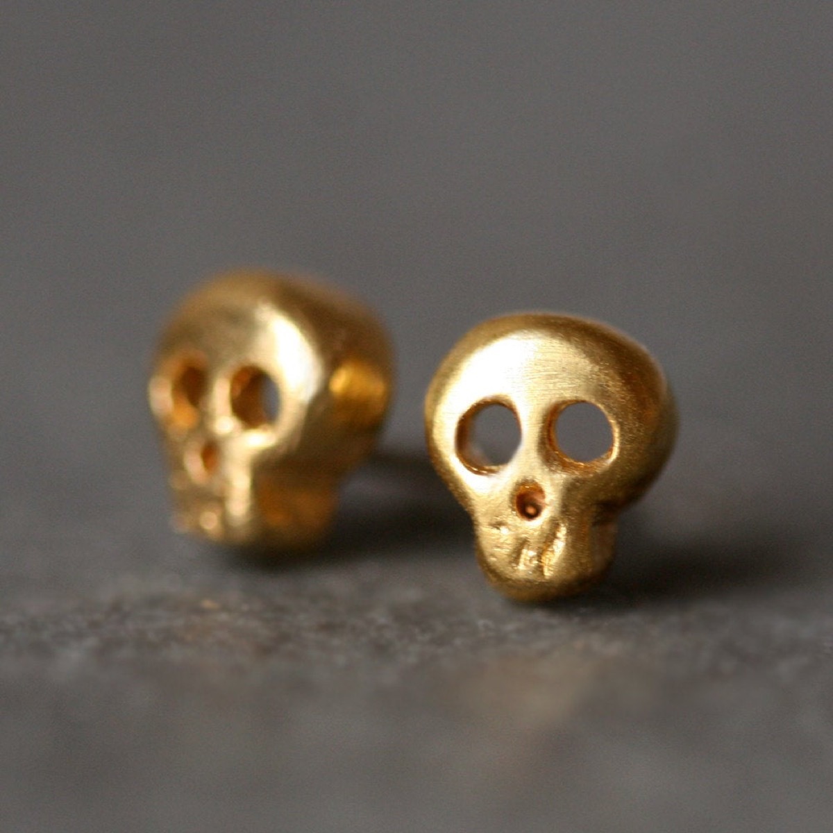 two gold skull earrings, Etsy jewelry