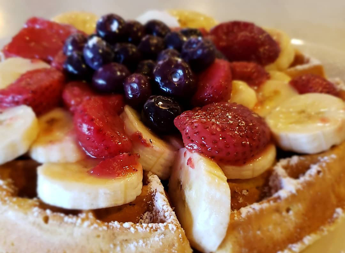 waffle topped with bananas and strawberries