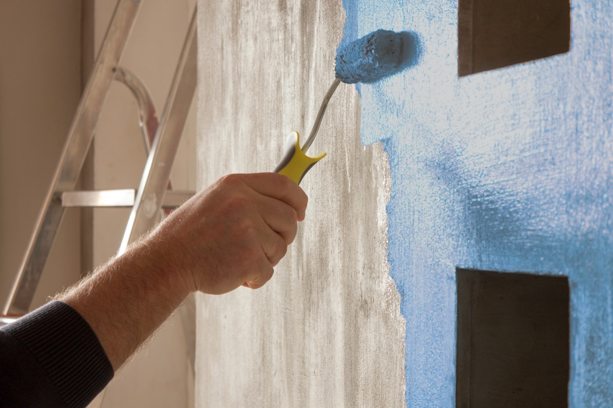 hand painting kitchen wall blue 