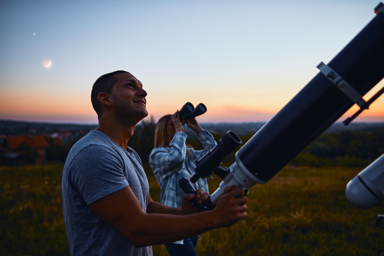 Couple stargazing together