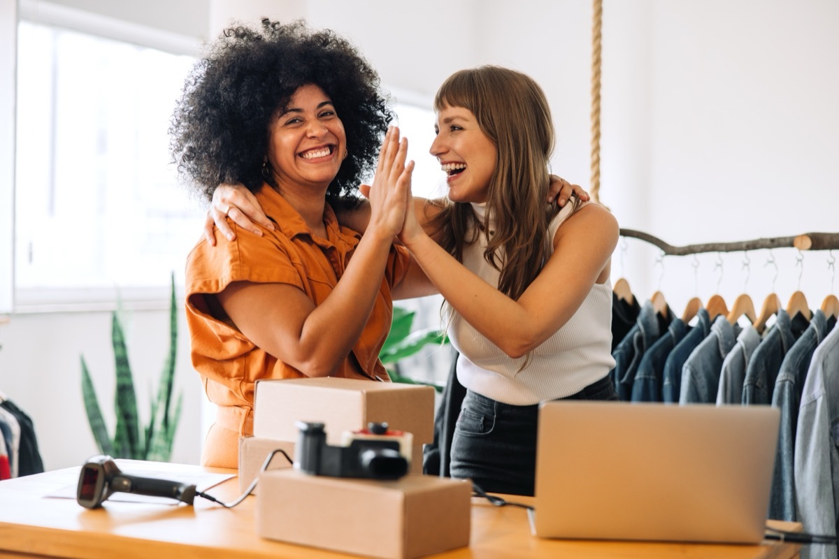 Two Women High Fiving