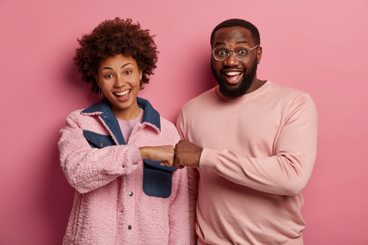 Black Couple Wearing Pink Pastels