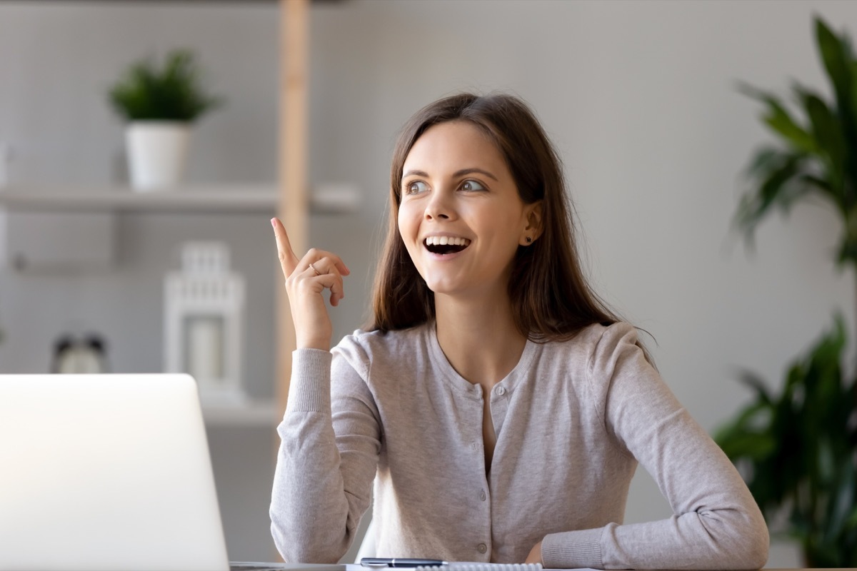 Woman excited as a she finally thinks of the answer